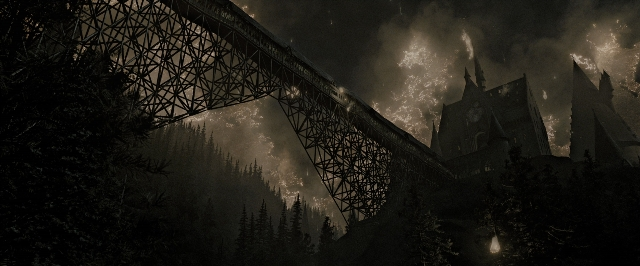 Wide shot frame from Harry Potter and the Deathly Hallows - Part 2 — tower, smoke, forest