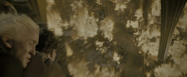 Wide shot frame from Harry Potter and the Deathly Hallows - Part 2 — sitting, face, hair