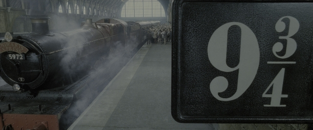 Wide shot frame from Harry Potter and the Deathly Hallows - Part 2 — standing, plate, train