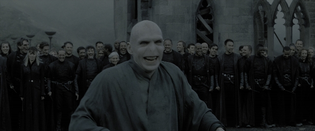 Wide shot frame from Harry Potter and the Deathly Hallows - Part 2 — standing, night, face