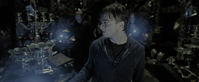 Wide shot frame from Harry Potter and the Deathly Hallows - Part 2 — standing, room, face
