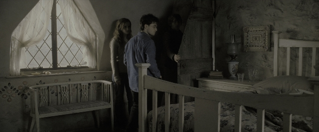 Wide shot frame from Harry Potter and the Deathly Hallows - Part 2 — standing, room, bed