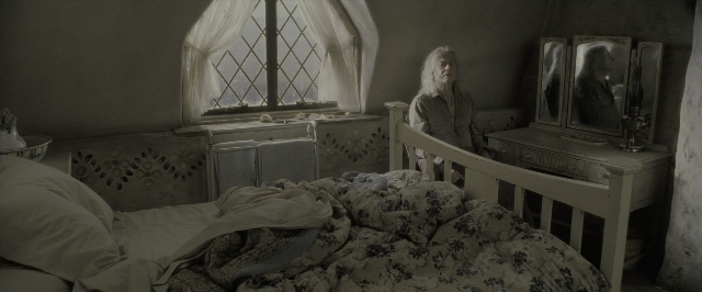 Wide shot frame from Harry Potter and the Deathly Hallows - Part 2 — sitting, room, bed
