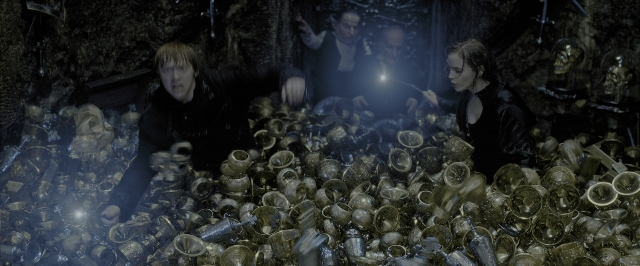 Wide shot frame from Harry Potter and the Deathly Hallows - Part 2 — standing, room, glass