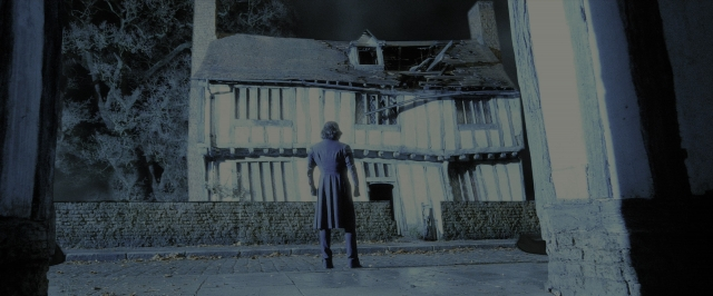 Wide shot frame from Harry Potter and the Deathly Hallows - Part 2 — standing, street, coat