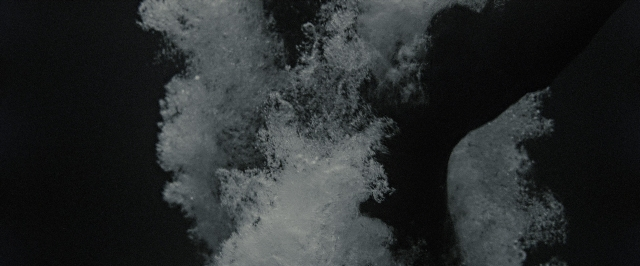 Wide shot frame from Harry Potter and the Deathly Hallows - Part 2 — smoke, fountain