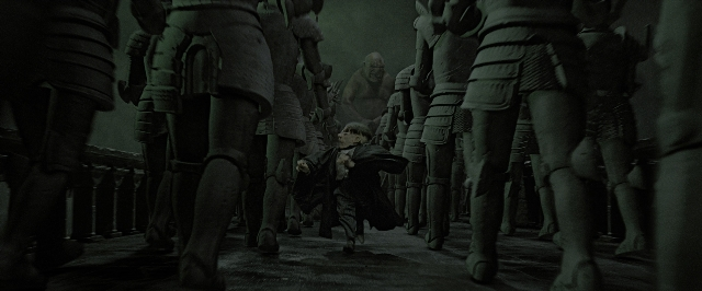 Wide shot frame from Harry Potter and the Deathly Hallows - Part 2 — walking, hand, suit