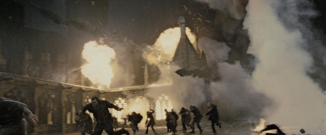 Wide shot frame from Harry Potter and the Deathly Hallows - Part 2 — walking, street, fire
