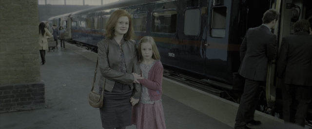 Wide shot frame from Harry Potter and the Deathly Hallows - Part 2 — standing, suit, tie