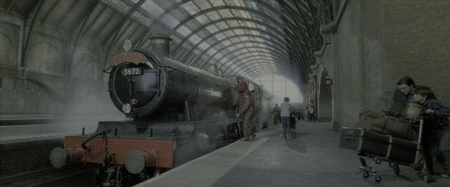 Wide shot frame from Harry Potter and the Deathly Hallows - Part 2 — standing, train, wheel