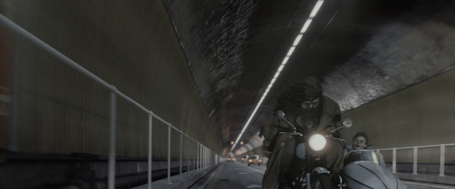 Wide shot frame from Harry Potter and the Deathly Hallows - Part 1 — street, hat, face