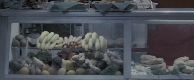 Wide shot frame from Harry Potter and the Deathly Hallows - Part 1 — kitchen, glass, green vegetables