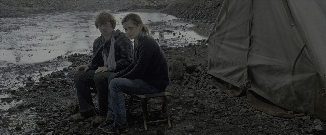 Wide shot frame from Harry Potter and the Deathly Hallows - Part 1 — sitting, tent, hair