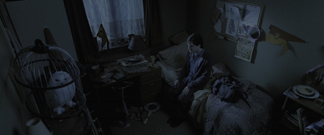 Wide shot frame from Harry Potter and the Deathly Hallows - Part 1 — sitting, room, bed