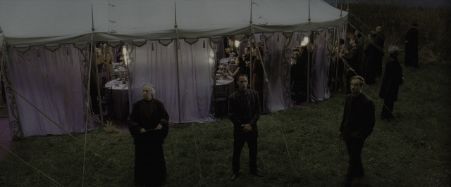 Wide shot frame from Harry Potter and the Deathly Hallows - Part 1 — standing, dialogue, night