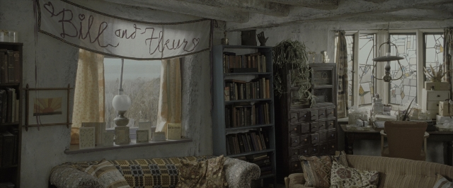 Wide shot frame from Harry Potter and the Deathly Hallows - Part 1 — book, room, table