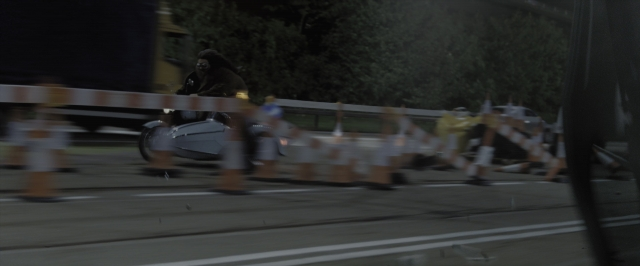 Wide shot frame from Harry Potter and the Deathly Hallows - Part 1 — standing, street, car