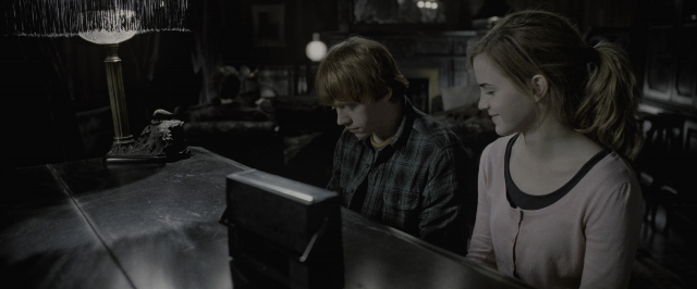 Wide shot frame from Harry Potter and the Deathly Hallows - Part 1 — sitting, room, dialogue