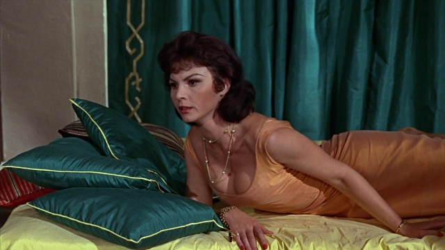Wide shot frame from From Russia with Love — bed, dress, face