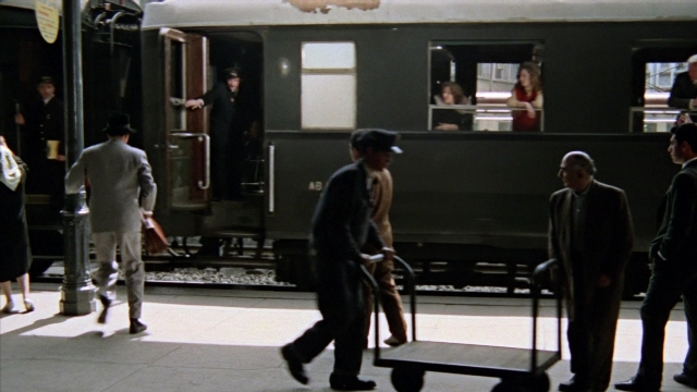 Wide shot frame from From Russia with Love — standing, walking, train
