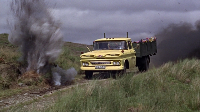 Wide shot frame from From Russia with Love — action, street, drive