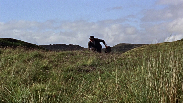 Frame from From Russia with Love — walking, hat, dog