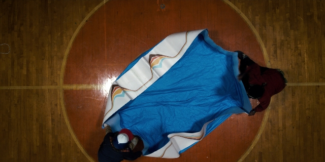 Wide shot frame from Stranger Things — standing, person, footwear