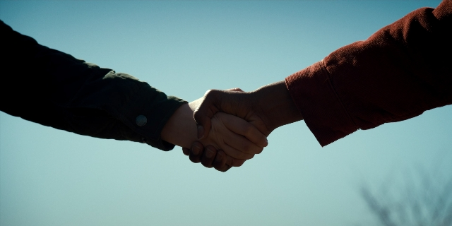 Frame from Stranger Things — person, human hand