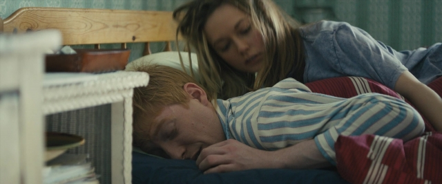 Frame from About Time — bed, lamp, person