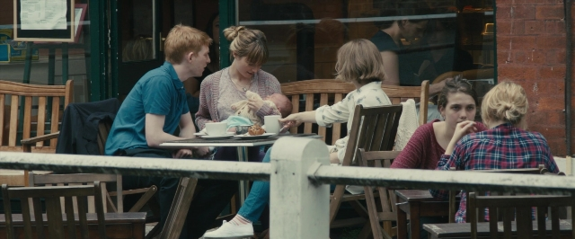 Wide shot frame from About Time — sitting, table, dialogue