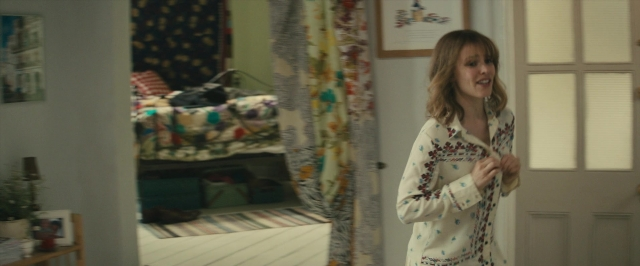 Wide shot frame from About Time — standing, room, bed