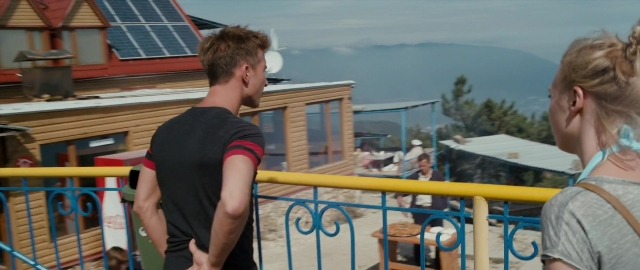 Wide shot frame from Kak menya zovut — sitting, standing, shirt