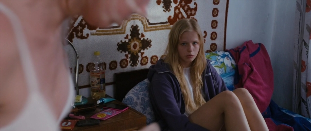 Wide shot frame from Kak menya zovut — sitting, room, bed