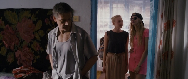 Wide shot frame from Kak menya zovut — standing, room, bed