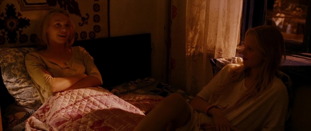 Wide shot frame from Kak menya zovut — sitting, room, bed