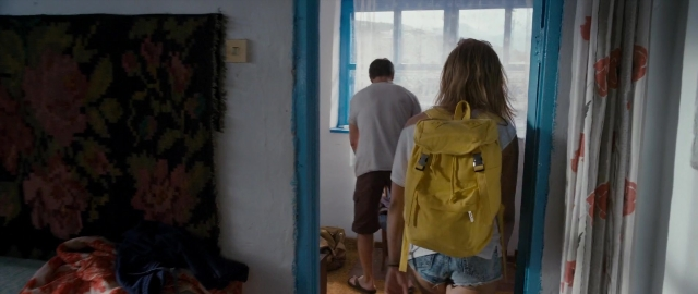 Wide shot frame from Kak menya zovut — walking, house, shirt