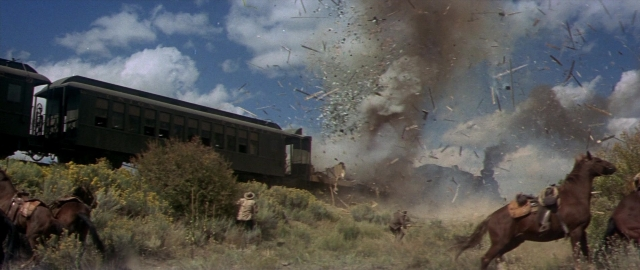Wide shot frame from Butch Cassidy and the Sundance Kid — horse, train, smoke