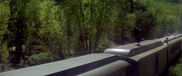 Wide shot frame from Butch Cassidy and the Sundance Kid — standing, train, person