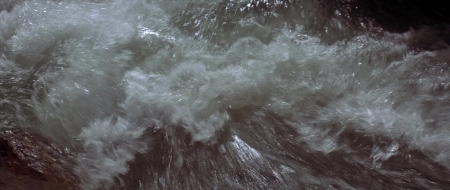 Wide shot frame from Butch Cassidy and the Sundance Kid — water, fountain