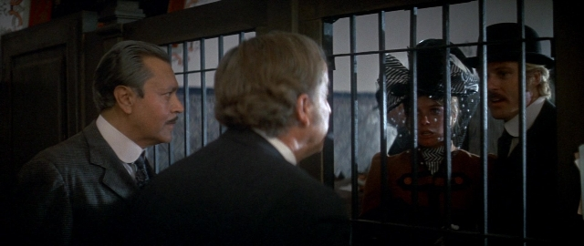 Wide shot frame from Butch Cassidy and the Sundance Kid — book, standing, room