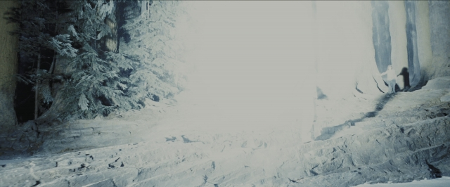 Wide shot frame from Harry Potter and the Prisoner of Azkaban — walking, snow, person