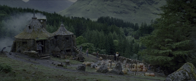 Wide shot frame from Harry Potter and the Prisoner of Azkaban — sitting, standing, person