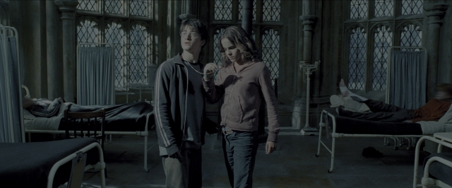 Wide shot frame from Harry Potter and the Prisoner of Azkaban — standing, room, dialogue