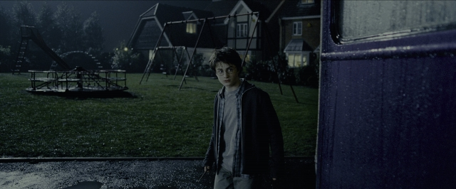 Wide shot frame from Harry Potter and the Prisoner of Azkaban — standing, hand, night