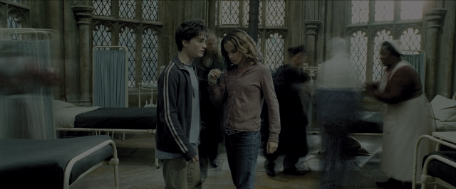 Wide shot frame from Harry Potter and the Prisoner of Azkaban — walking, room, dialogue