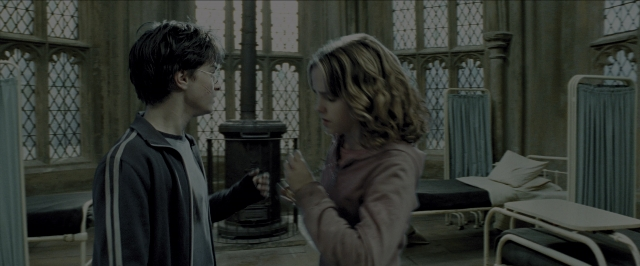 Wide shot frame from Harry Potter and the Prisoner of Azkaban — standing, room, dialogue