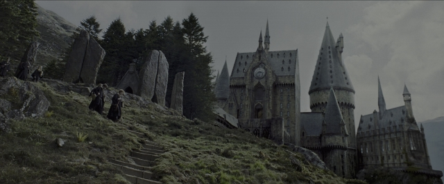 Wide shot frame from Harry Potter and the Prisoner of Azkaban — standing, walking, tower