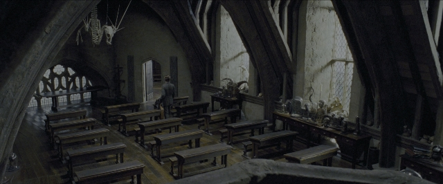 Wide shot frame from Harry Potter and the Prisoner of Azkaban — table, furniture, window