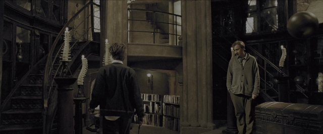 Wide shot frame from Harry Potter and the Prisoner of Azkaban — standing, room, dialogue