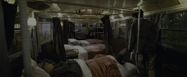 Wide shot frame from Harry Potter and the Prisoner of Azkaban — standing, car, train